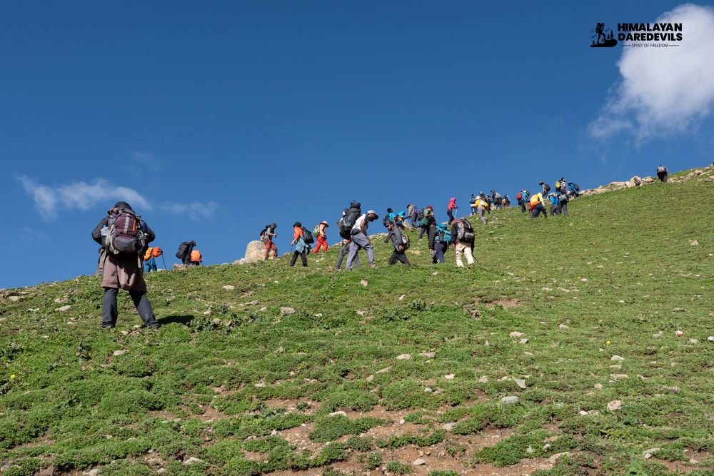 Trekkers hiking along a scenic trail in Kashmir Great Lakes.